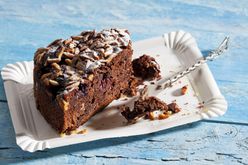 Choco almond cake and patry fork on paper plate