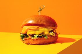 Cheeseburger on yellow and orange background