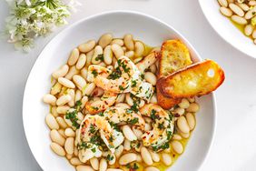 Overhead View of Buttery Shrimp With Marinated White Beans Served in White Bowl