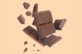 is there caffeine in chocolate? chocolate bar on a light peach background