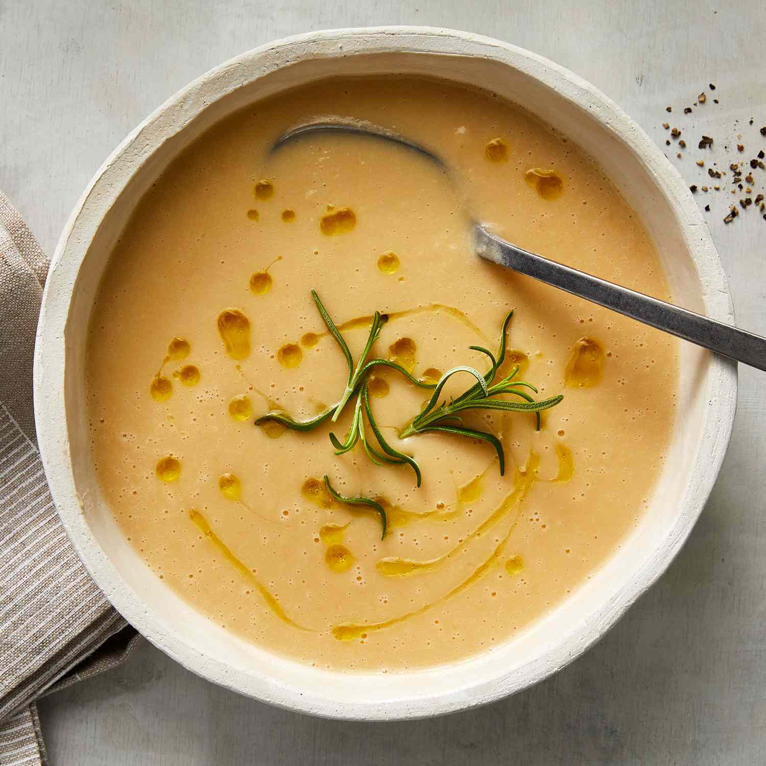 In this recipe for Creamy Miso White Bean Soup, miso blends into the silky base, drawing out the fresh rosemary leaves, heightening the richness of butter, and adding savory depth to the cannellini beans.