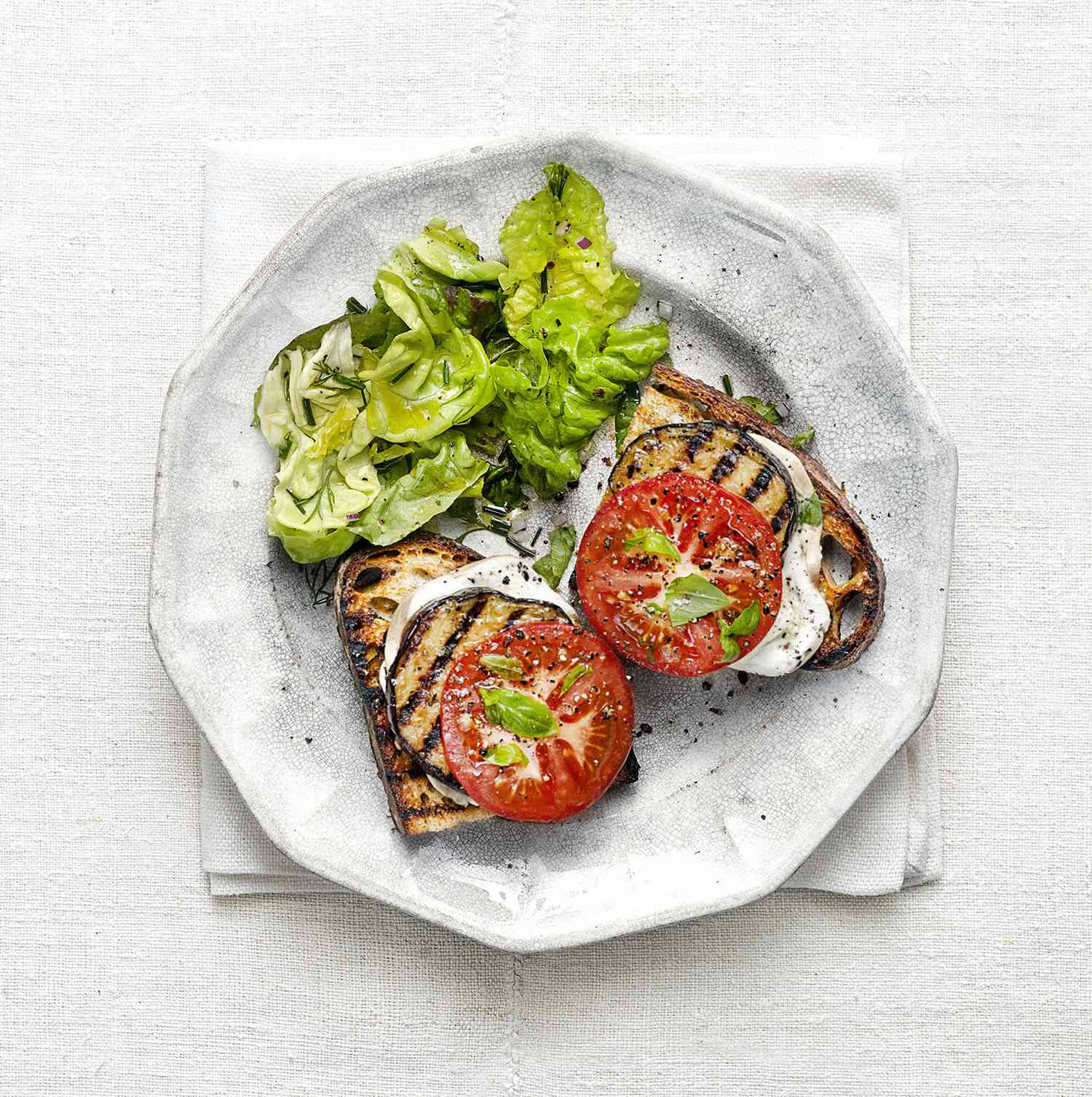 Grilled Eggplant and Smoked Mozzarella Melts, Served Open-Face With Greens