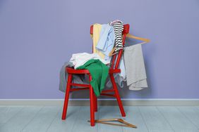 chair with clothes on it