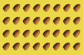 Should You Take a Food Sensitivity Test? Experts Weigh In: Full frame shot of many almonds On Yellow Background And One Capsule