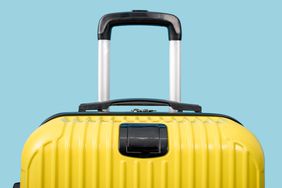 yellow suitcase on blue