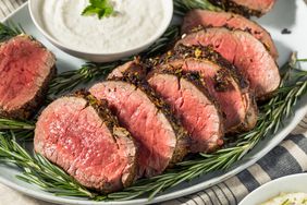 sliced pot roast served with horseradish and potatoes