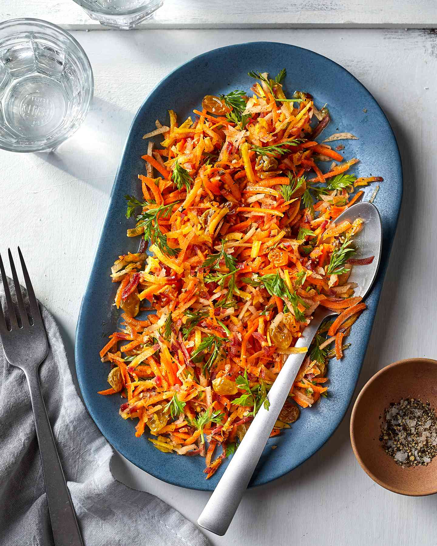 Garlicky, cumin-spiced oil enhances the flavor in this recipe for Spiced Carrot Salad.