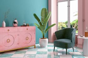 Tropical living room design with shades of millennial pink and teal.