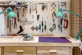 Craftsman's tools and workshop inside an organized garage