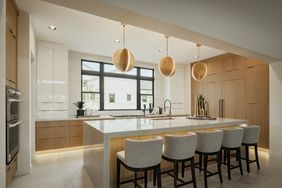 kitchen with exposed light wood and acrylic white cabinets