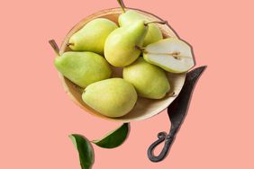 Bunch of pairs in a bowl on pink background