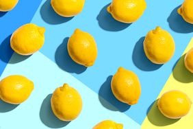 group of lemons on a blue background