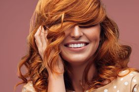 woman with wavy red hair