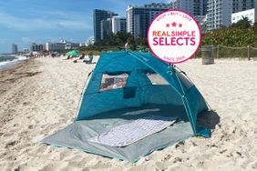 The Lightspeed Outdoors Quick Cabana Beach Tent on the sand at the beach