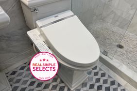 Toto C100 Washlet Electronic Bidet Toilet Seat installed on a toilet