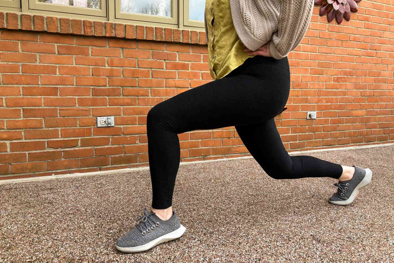 A person exercises while wearing Vuori Elevation Ruched Leggings