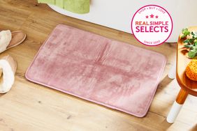 Genteele Memory Foam Bath Mat displayed on a wood floor