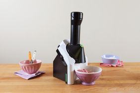 Yonanas Classic Soft-Serve Dessert Maker displayed with bowls on a wooden counter 