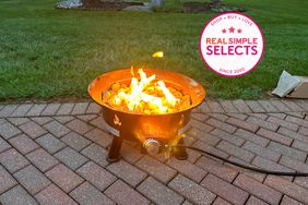 The Outland Living Firebowl in use outdoors 