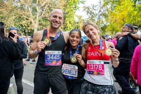 Sheinelle Jones holding medal from 2023 New York City Marathon