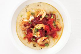 Overhead View of Smoky Shrimp and Grits in a White Bowl