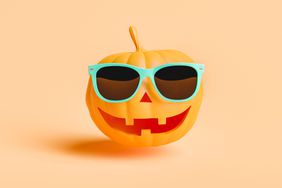 pumpkin with a happy face and sunglasses