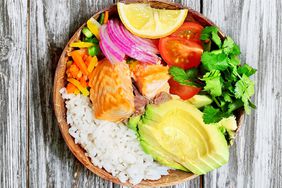 Rice bowl with vegetables and salmon