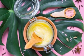 Traditional Indian food butter ghee in a glass jar closeup