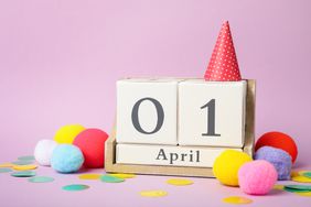 April 1st Calendar with party hat and pom-poms