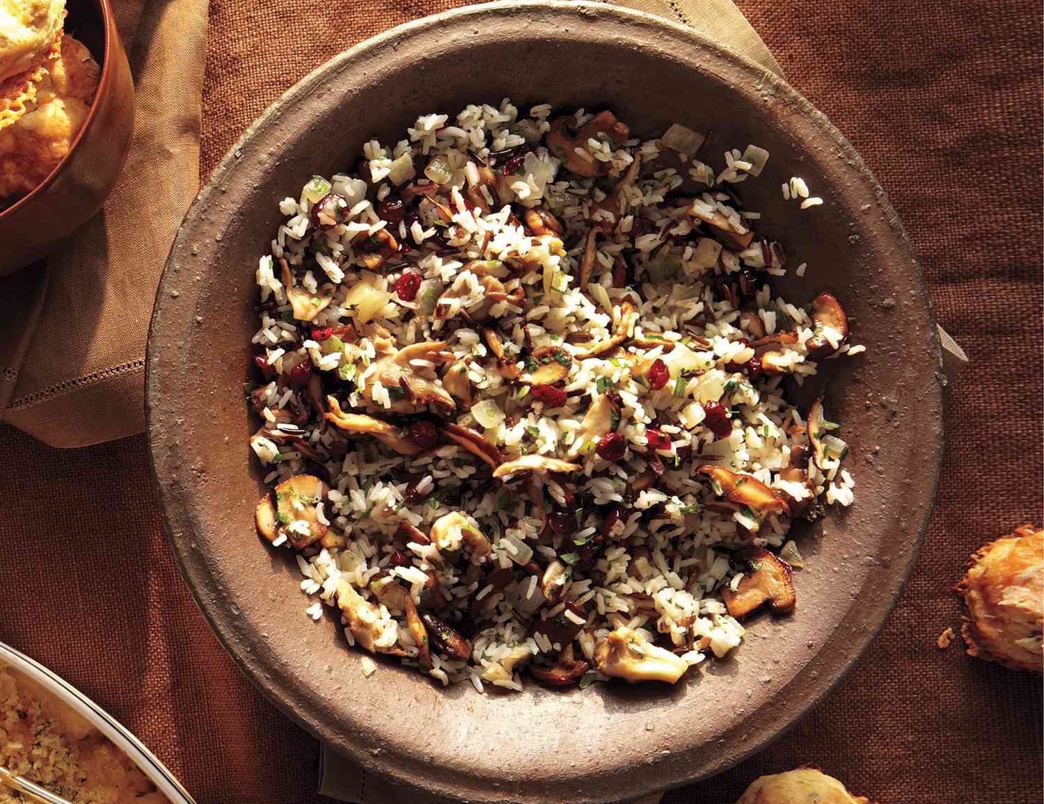 Wild Rice and Mushroom Pilaf With Cranberries in a Brown Bowl