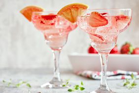 wine spritzers with fruit garnish